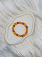 Buntes Perlenarmband in beige, orange und apricot Tönen