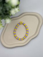 Leichtes Kinderarmband mit gelber Blume und Smiley