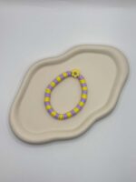 Mädchen Armband in Gelb Lila mit fröhlichem Smiley Design