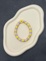 Handgemachtes Sommerarmband mit Blumenanhänger Smiley