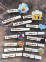 Gravierte Holz Glubberl mit Oktoberfest Motiven und bayerischen Ausdrücken