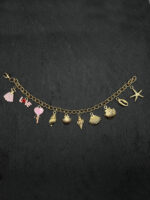 Charm Armband mit Muscheln, Seestern und maritimen Charms – goldfarbenes DIY Schmuckstück